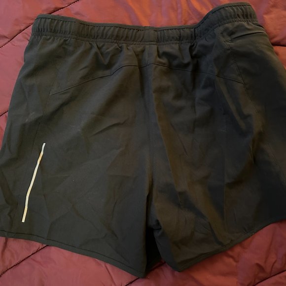 Salomon brand RUNNING SHORTS stash pocket Exercise dolphin size S, NWOT - Picture 2 of 5